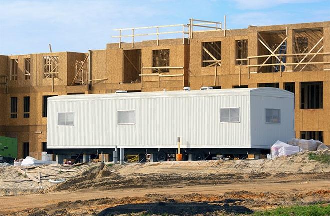 office trailers and equipment rental at a construction site in Lasara